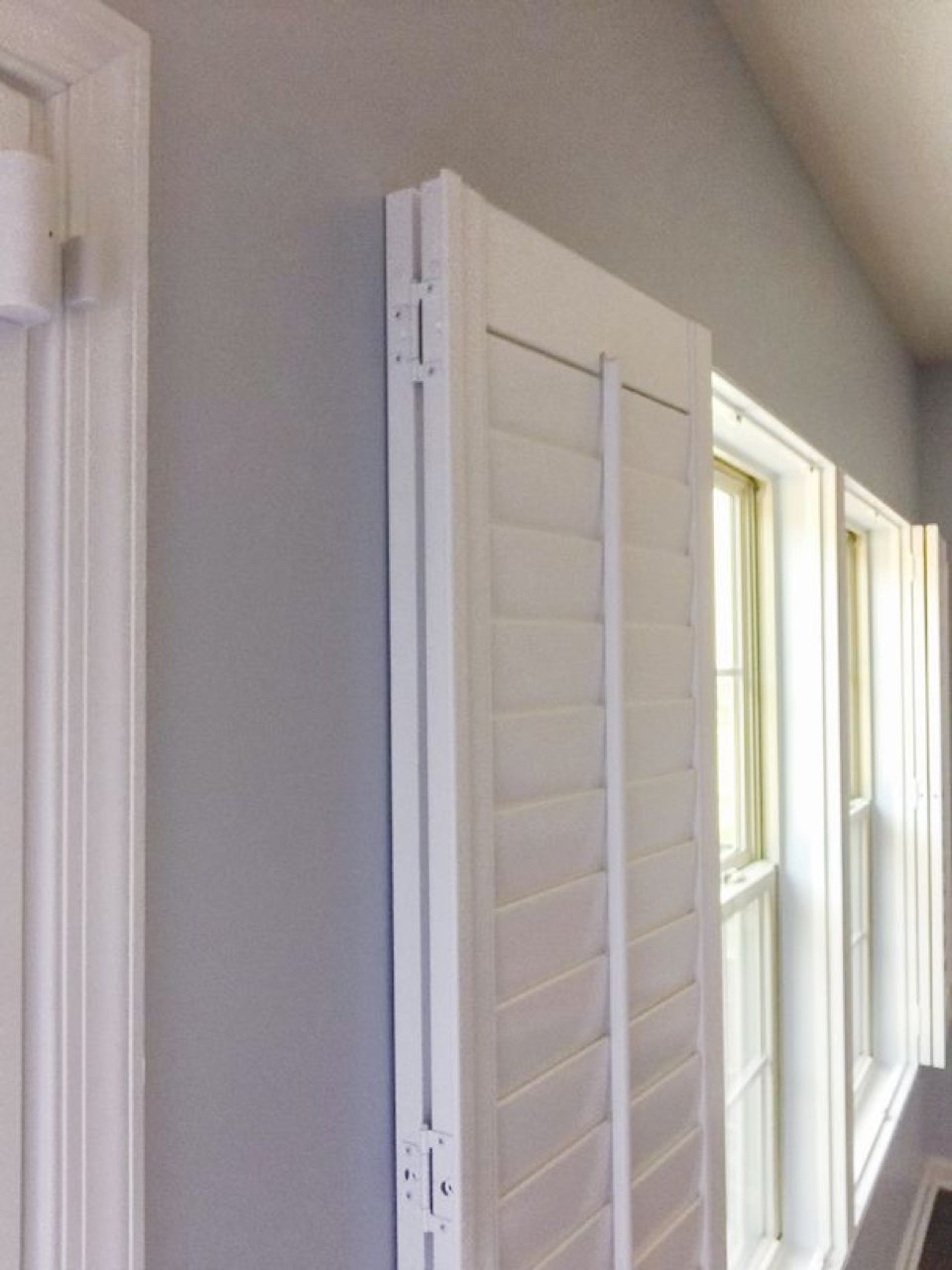 Close-up of bifold shutter hinge configuration