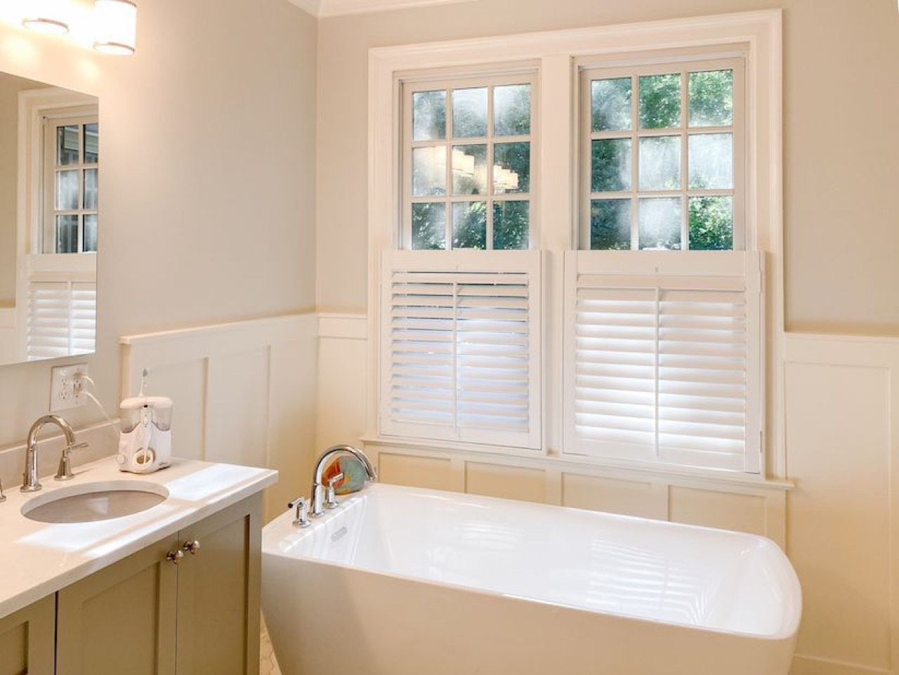 Café shutters over a bathtub window for privacy