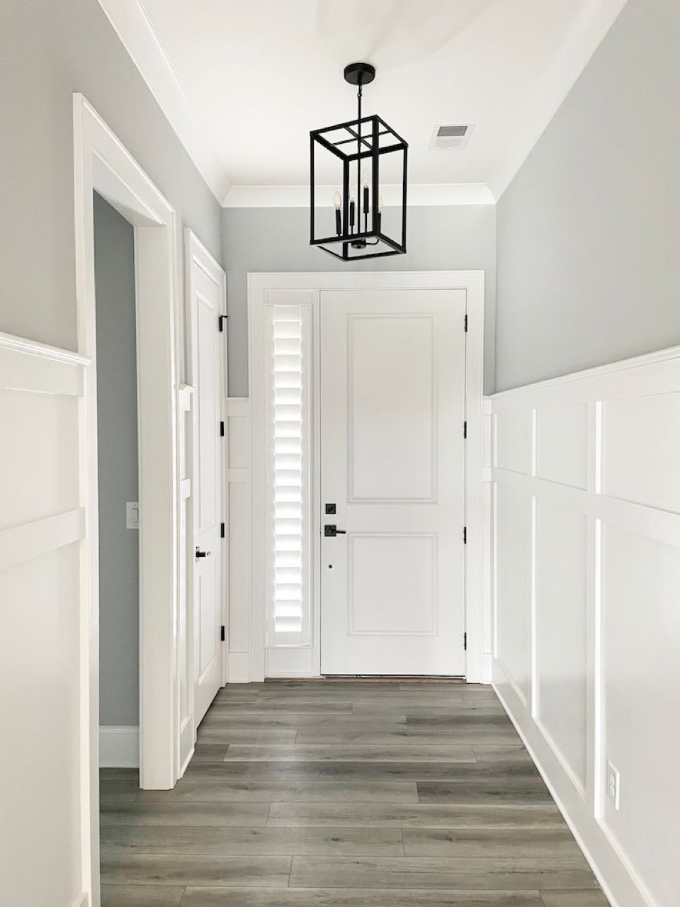 4-inch louver sidelite shutter beside a door
